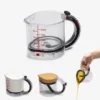 Adjustable Multi-Size Measuring Cup